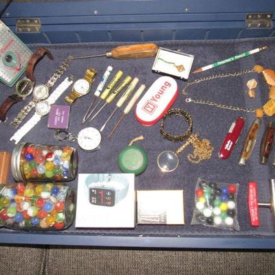Marbles, advertisement pieces, boy scout camera and more
