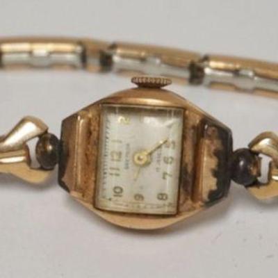 1128	14K GREYGOR LADIES 17 JEWEL WATCH AS FOUND
