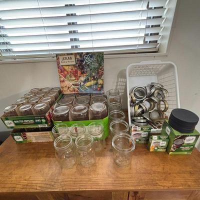 Lot #103 - Ball Mason Jar and Canning Accessories Lot - Includes Recipe Books and Lids.