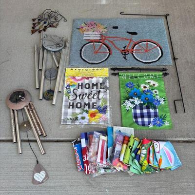 Lot #147 - Outdoor Decor Lot - Garden Flags, Wind Chimes, Doormat