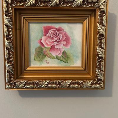 Original in ornate gold wood frame. 