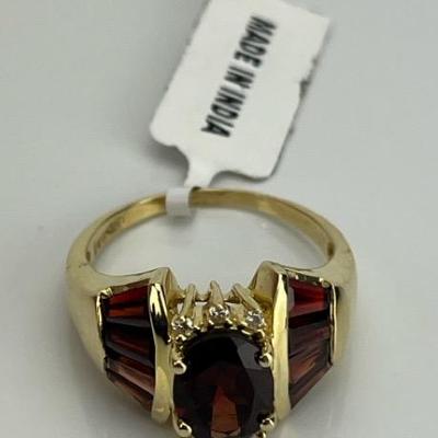 A 14k Yellow Gold 3 TCW Oval-Cut Garnet Ring