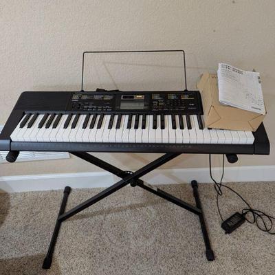 Lot #140 - Casio CTK-2400 Keyboard With Stand & Headphones