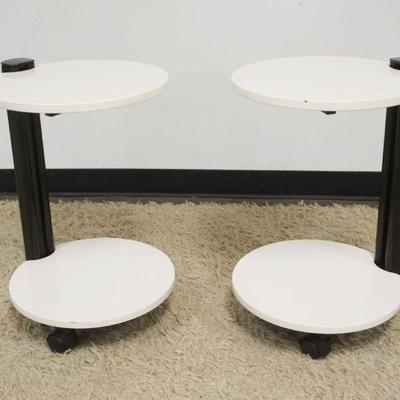 1122	PAIR OF MODERN STYLE LAMP STAND ON CASTERS, EACH APPROXIMATELY 17 IN X 16 IN X 25 IN H
