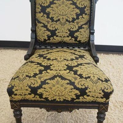 1103	VICTORIAN UPHOLSTERED PARLOR CHAIR IN EBONIZED FINISH
