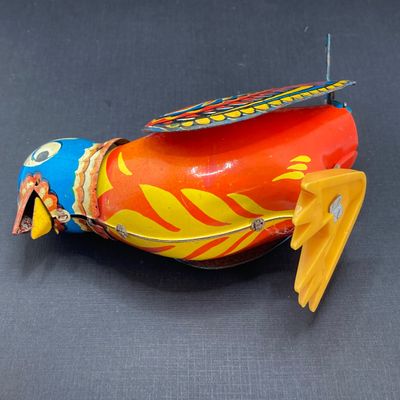 LOT 300: Vintage Toys - Tin / Metal Colorful Bird and Plastic Bird Watch