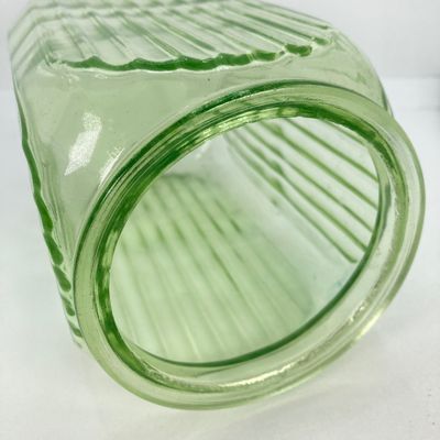 LOT 296: Lidded Uranium Glass Jars