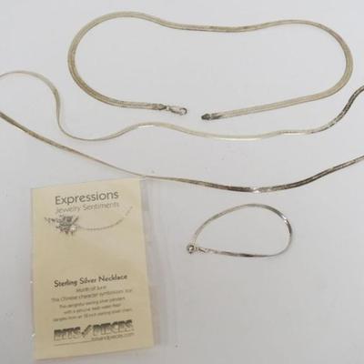 1165	2 STERLING SILVER NECKLACES AND MATCHING BRACELET, APPROXIMATELY .81 TOZ AND EXPRESSION STERLING SILVER CHINESE NECKLACE IN ORGINAL...