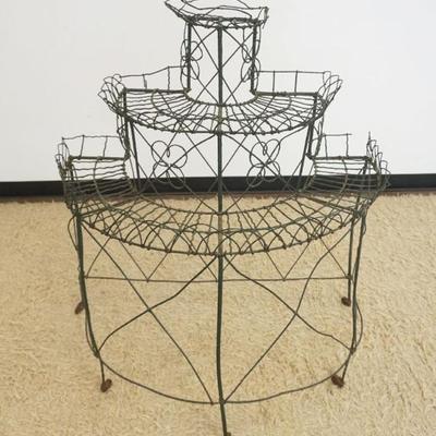 1252	VICTORIAN WIRE HALF ROUND 3 TIER PLANT STAND, APPROXIMATELY 40 IN X 24 IN X 45 IN H
