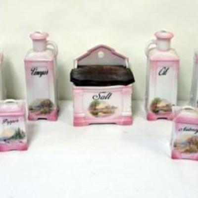 1214	VICTORIA CZECHO SLOVAKI 13 PIECE CANNISTER SET, LARGEST PIECE APPROXIMATELY 9 1/2 IN H, SOME LOSS TO 2 CANNISTERS
