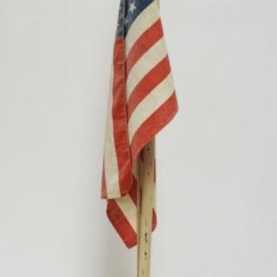 1102	VINTAGE FOLK ART AMERICAN FLAG ON STAND, APPROXIMATELY 35 IN HIGH
