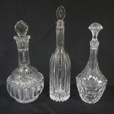1157	3 CRYSTAL DECANTORS, LARGEST APPROXIMATELY 14 IN HIGH
