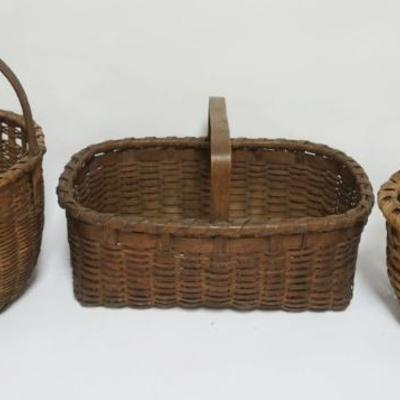 1101	GROUP OF 3 WOVEN SPLINT BASKETS, LARGEST APPROXIMATELY 17 1/2 IN X 12 IN X 10 1/4 IN
