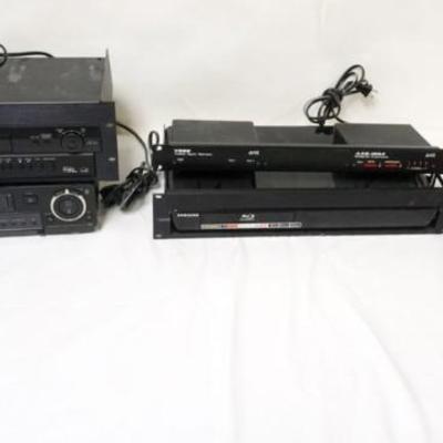 1267	2 VHS TAPE PLAYERS AND SANSUNG BLUE RAY AND REMOTE POWER ACCESSORIES
