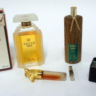 1231	GROUP OF ASSORTED PERFUMES INCLUDING GUCCI NO 3
