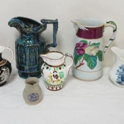 1125	GROUP OF ASSORTED PITCHERS INCLUDING MYOTT & SONS, RODDYWARE, J&G MEAKIN, HORSEMAN & CAPODIMONTI, LARGEST APPROXIMATELY...