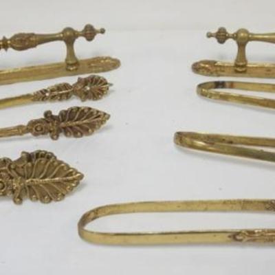 1243A	ORNATE BRASS TIE BACKS AND BRASS HANDLES, EACH APPROXIMATELY 11 IN LONG
