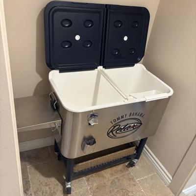 TOMMY BAHAMA STAINLESS COOLER
Available for presale.  Please refer to "Presale" information.  TEXT 760-668-0554 to buy