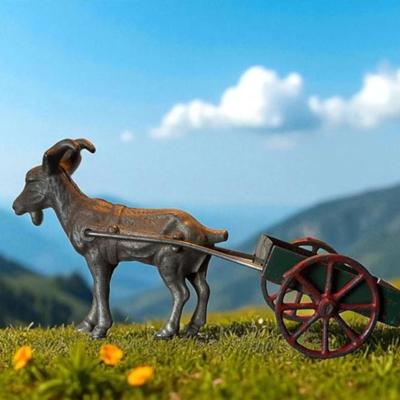 Vintage cast iron goat cart