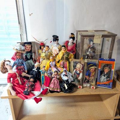 Lot #273 - Vintage Collectible Global Dolls Set with Diverse Costumes and Styles