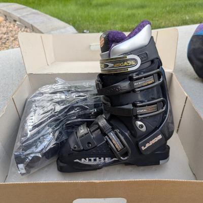 Lot #314 - New in Box Lange Anthe 7 Ski Boots and Bolle Kids Snowboard/Ski Helmet, Plus Ski Bag and Poles