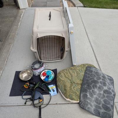 Lot #301 - Pet Carrier with Accessories including Leash, Bed, and Toys