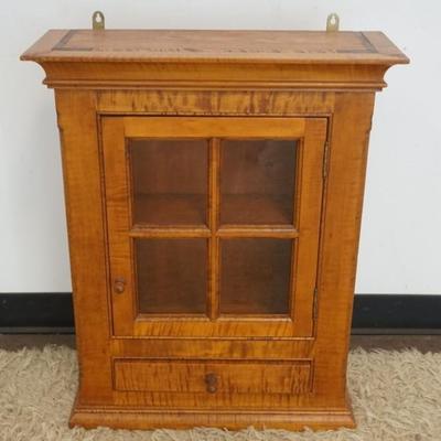 1264	D.R. DIMES BENCH MADE HANGING TIGER MAPLE CABINET WITH 1 DOOR, 1 DRAWER STOP CHAMFERED SIDES, APPROXIMATELY 23 IN X 9 IN X 28 IN H
