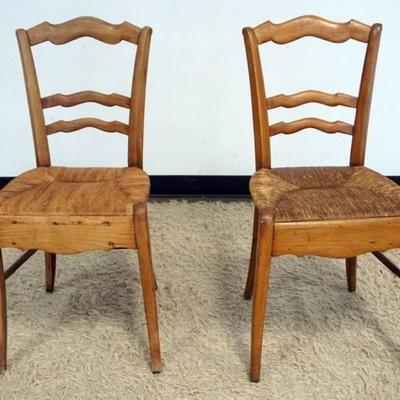 1226	PAIR OF COUNTRY FRENCH RUSH SEAT SIDE CHAIRS, EACH APPROXIMATELY 16 IN X 16 IN X 34 IN H
