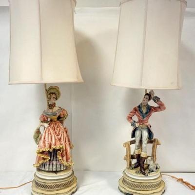 1140	PAIR OF PORCELAIN FIGURAL TABLE LAMPS OF MAN AND WOMAN, EACH APPROXIMATELY 39 IN H
