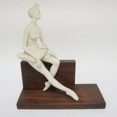 1115	CYBIS BISQUE *ON-CUE* BALLERINA MOUNTED ON WOOD BASE, APPROXIMATELY 13 IN H
