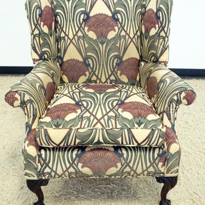 1241	UPHOLSTERED BALL & CLAW FOOT WING CHAIR, SOME FADING, APPROXIMATELY 30 IN X 29 IN X 40 IN H
