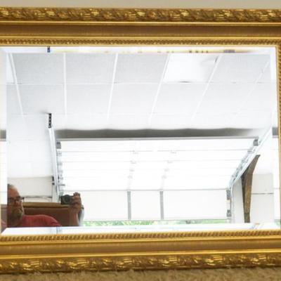 1191	LABARGE ORNATE GILT DEEP WELL FRAMED BEVELED EDGE MIRROR, APPROXIMATELY 45 IN X 33 IN
