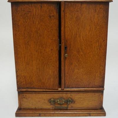 1146	ANTIQUE WALNUT 2 DOOR, 1 DRAWER WITH 2 INTERIOR DRAWERS, APOTHICARY CHEST, APPROXIMATELY 13 IN X 8 IN X 17 IN H

