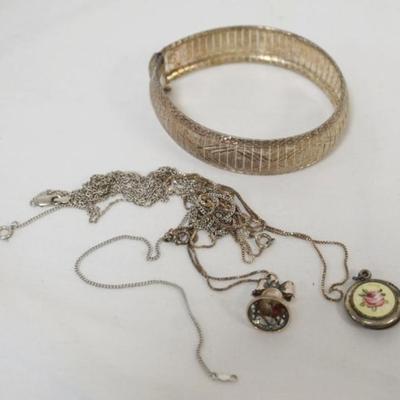 1166	LADIES STERLING SILVER LOCKET, BRACELET AND 4 NECKLACES MARKED ITALY, 1.67 TOZ
