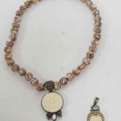 1152	MOON FACE PENDANT AND MOON FACE NECKLACE, BOTH PENDANTS STERLING SILVER

