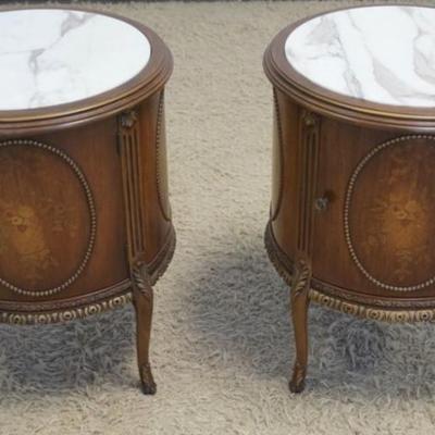 1204	PAIR OF OUTSTANDING ITALIAN ROUND MARBLE TOP 1 DOOR STANDS WITH INLAID FLOWERS IN BASKETS ALL AROUND, APPROXIMATELY 22 IN D X 28 IN H
