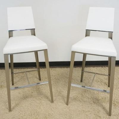 1259	2 CONTEMPORARY MODERN STYLE CHROME AND LEATHER BAR STOOLS, SEAT HEIGHT APPROXIMATELY 31 IN H, OVERALL HEIGHT APPROXIMATELY 44 IN H
