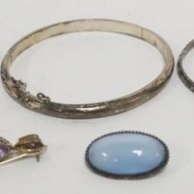 1214	LADIES STERLING SILVER JEWELRY ASSORTMENT INCLUDING 3 BANGLE BRACELET, 1 BLUE STONE PIN AND AMETHYST EARRINGS, 1.05 OZT INCLUDING...