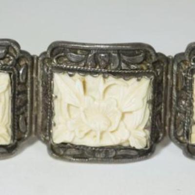 1201	SILVER INLAID BRACELET MARKED CHINA SILVER, INLAID PIECES HAVE A FLORAL DESIGN, 1.11 OZT TOTAL WEIGHT, APPROXIMATELY 7 IN 
