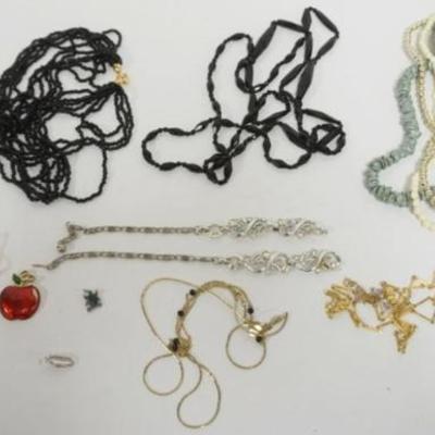 1207	10 LADIES NECKLACES MANY MARKED BY MAKER INCLUDING 2 BLACK GLASS BEAD NECKLACES, AND 4 PENDANTS
