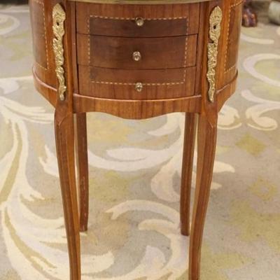1276	SMALL OVAL 3 DRAWER STAND WITH BRONZE GALLERY TOP AND APPLIED MOUNTS, APPROXIMATELY 16 IN X 13 IN X 29 IN H
