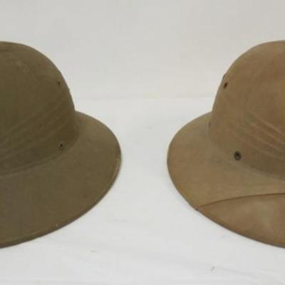 1123	2 PITH HELMETS
