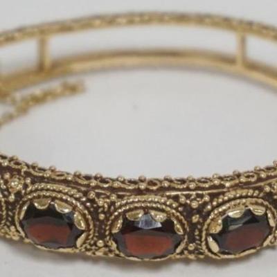 1203	14K GOLD RUBY OR GARNET LADIES BRACELET , 19.81 DWT INCLUDING STONES

