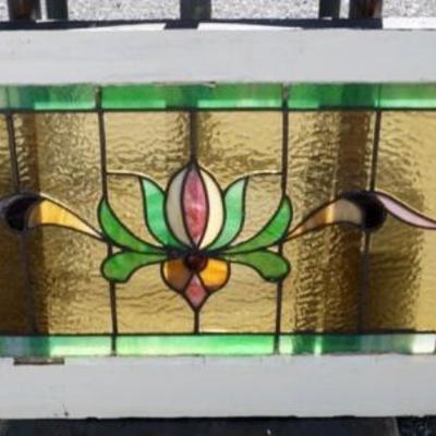 1141	STAIN GLASS WINDOW, APPROXIMATELY 18 IN X 42 IN
