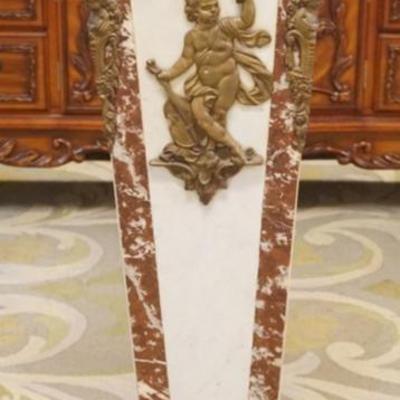 1264	TAPERED MARBLE PEDESTAL WITH BRONZE TRIM AND MOUNTS, APPROXIMATELY 12 IN X 11 IN X 44 IN H, LOSS TO TOP LEFT CORNER
