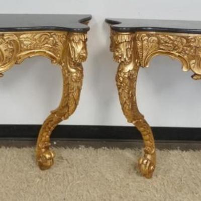 1259	PAIR OF GILT WOOD MARBLE TOP WALL MOUNTED STANDS, APPROXIMATELY 46 IN X 14 IN X 33 IN H
