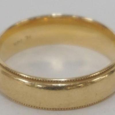 1215	14K GOLD BAND APPROXIMATE SIZE 8 1/2 MARKED WITH HE COMBINATION AND 14K, 14.34 DWT
