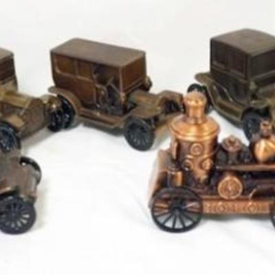1108	GROUP OF ASSORTED CAST METAL CAR AND RELATED BANKS
