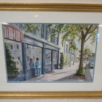 1145	FRAMED WATERCOLOR, JOHN SACALIS, IMAGE OF WOMAN LOOKING IN STORE FRONT WINDOW, APPROXIMATELY 23 IN X 30 IN OVERALL
