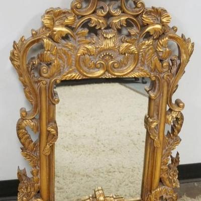 1178	GILT COMPOSITE FRAMED MIRROR, APPROXIMATELY 25 IN X 42 IN
